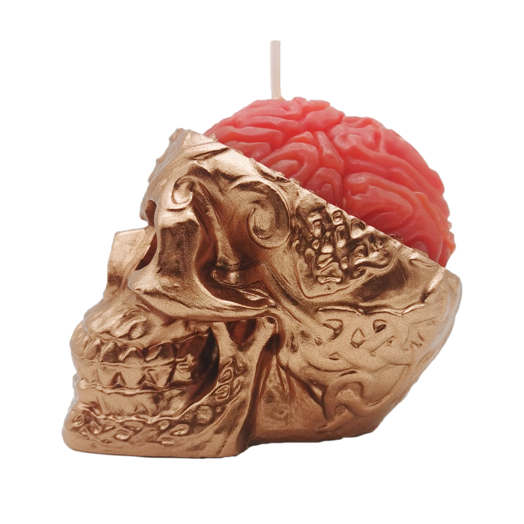 Left side view of the rose gold brain opened skull candle