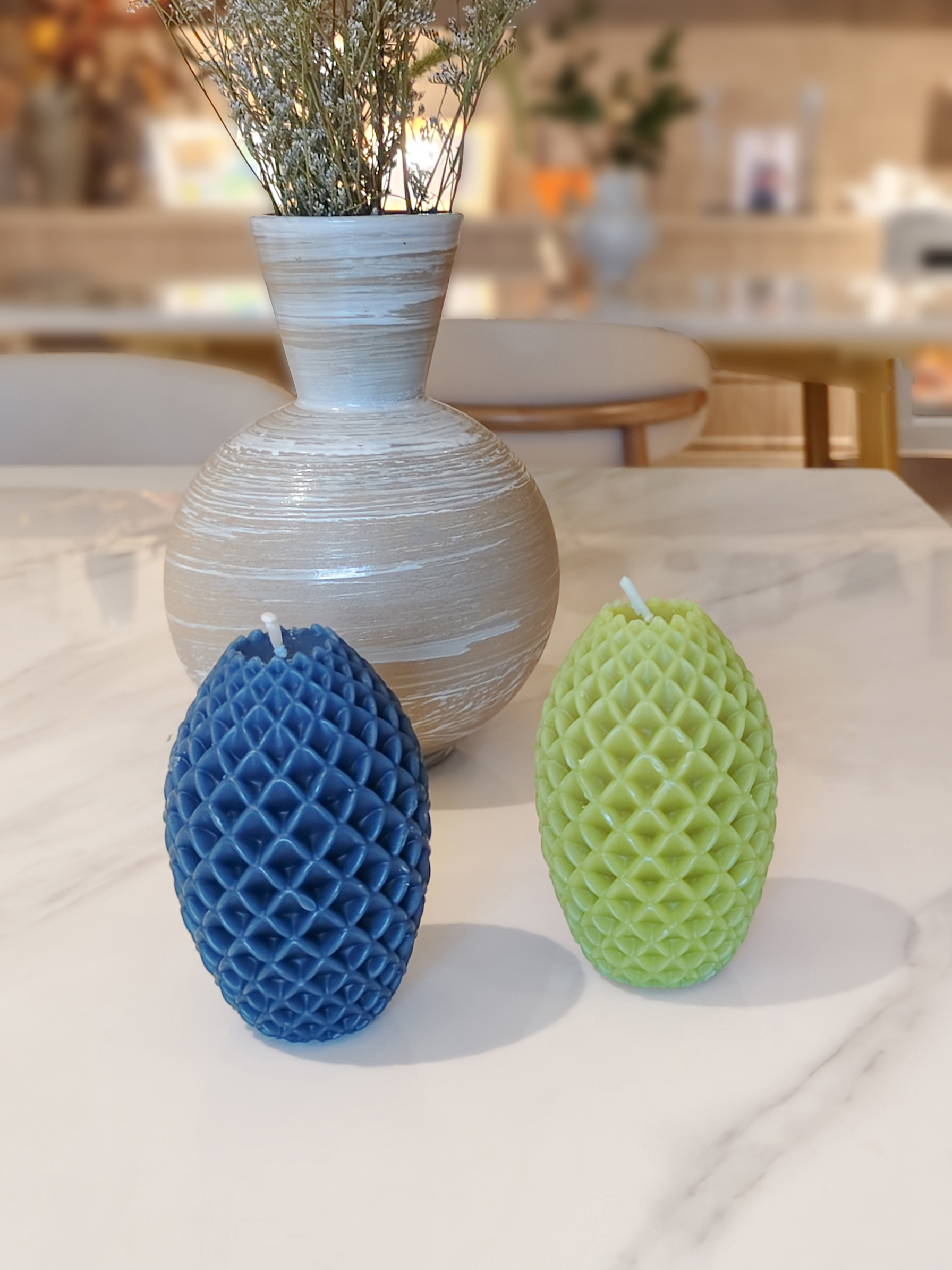 small pineapple candles on the platform