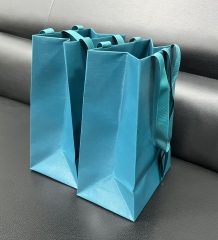 juyou paper Shopping bag with ribbed ribbon handle custom specialty luxury gift packaging textured paper bag