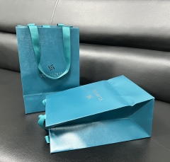 juyou paper Shopping bag with ribbed ribbon handle custom specialty luxury gift packaging textured paper bag