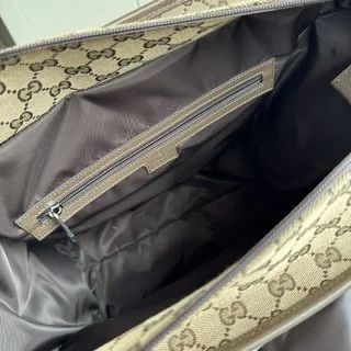 Gucci經典GG帆布母婴背包 - 實用與風格的完美結合