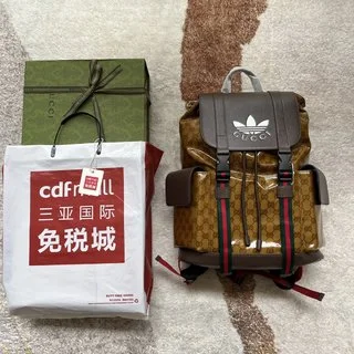 米色與棕色GG水晶帆布，飾有Gucci Trefoil圖案