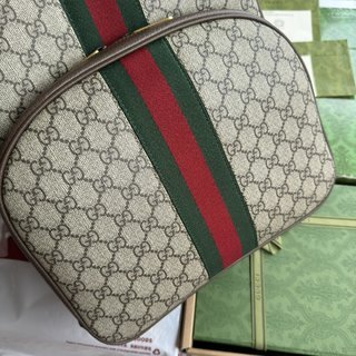 Supreme帆布書包 - 棕色皮革滾邊與紅綠條紋織帶的完美結合