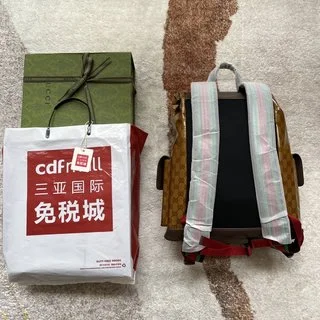 米色與棕色GG水晶帆布，飾有Gucci Trefoil圖案