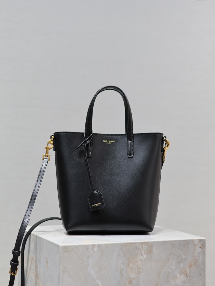 alt="Saint Laurent 黑色平纹牛皮迷你托特包，金色品牌刻印"