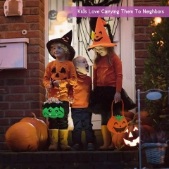 سلة حلوى الهالوين المصنوعة من اللباد بتصميم عنكبوت أسود من Trick or Treat لعام 2024