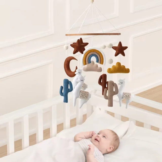 سرير أطفال من اللباد على شكل قوس قزح على شكل صبار ولاما من الألبكة