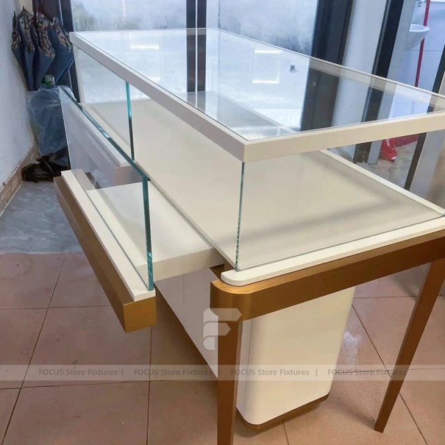 Refined Champagne Gold Jewelry Display Table