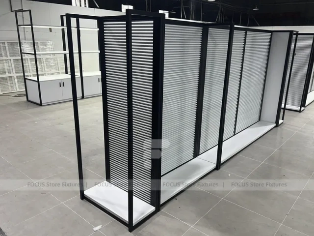 Black Framed Slatwall Partitions with Angled Corridor Layout for Wig Store