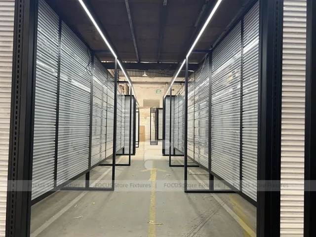 Illuminated Black Framed Slatwall Corridor Display System for Wig Store