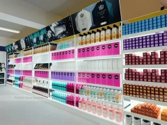 White Cosmetics Island Shelving with Green Branding Column for Wig Shop