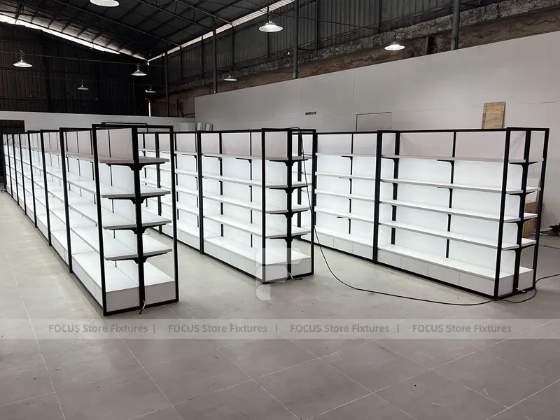 White Gondola Shelving Run with Black Framed Endcaps for Beauty Store