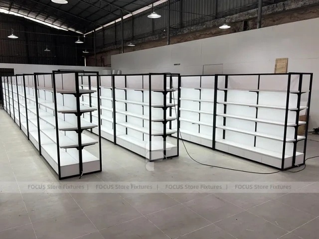 White Gondola Shelving Run with Black Framed Endcaps for Beauty Store