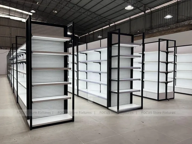 White Gondola Shelving Run with Black Framed Endcaps for Beauty Store