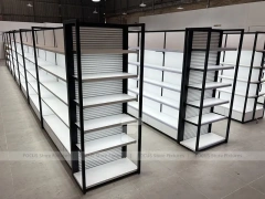 White Gondola Shelving Run with Black Framed Endcaps for Beauty Store