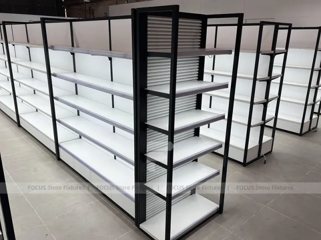 White Gondola Shelving Run with Black Framed Endcaps for Beauty Store