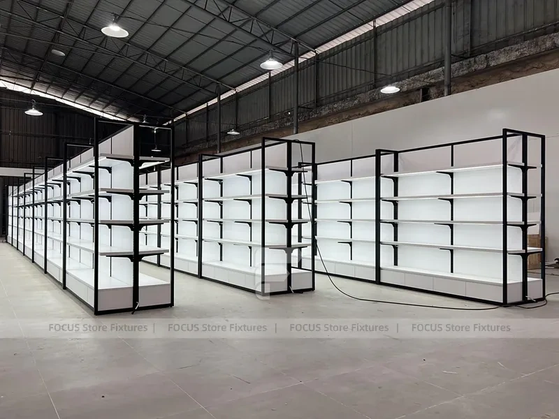 White Gondola Shelving Run with Black Framed Endcaps for Beauty Store
