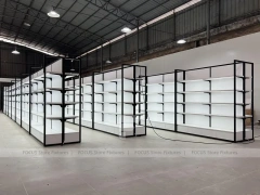 White Gondola Shelving Run with Black Framed Endcaps for Beauty Store
