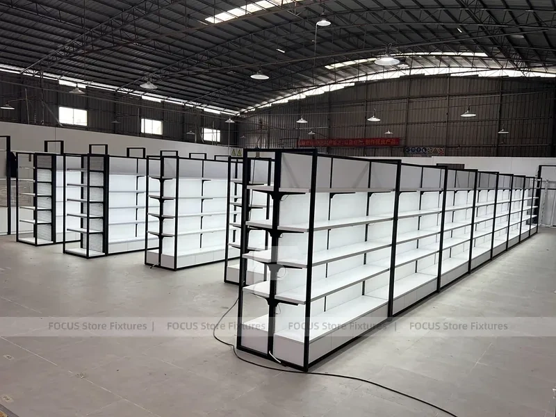 White Shelving Gondola Row with Black End Frames for Beauty Store