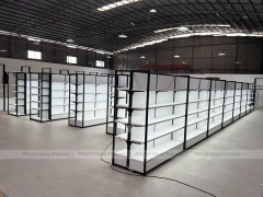 White Shelving Gondola Row with Black End Frames for Beauty Store