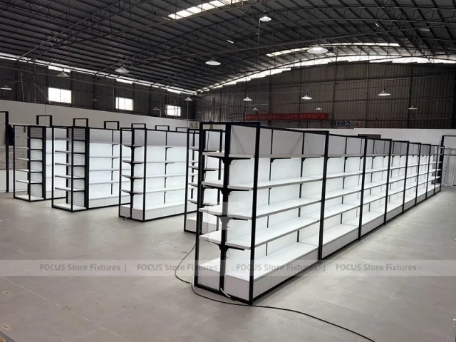 White Shelving Gondola Row with Black End Frames for Beauty Store
