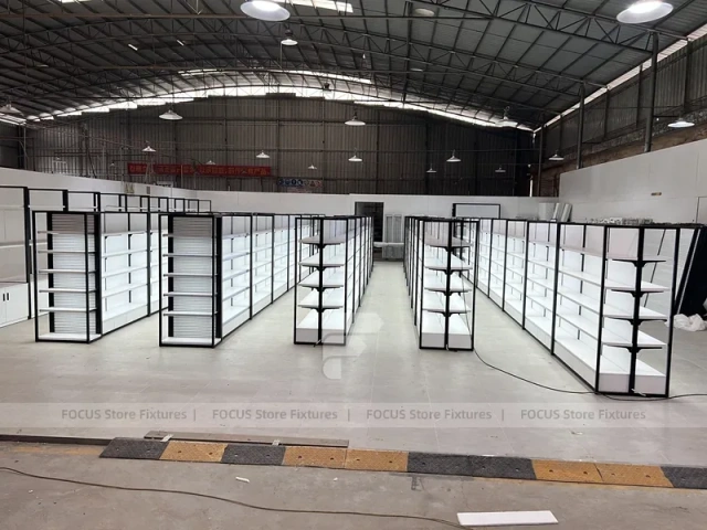 White Shelving Gondola Row with Black End Frames for Beauty Store