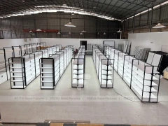 White Shelving Gondola Row with Black End Frames for Beauty Store