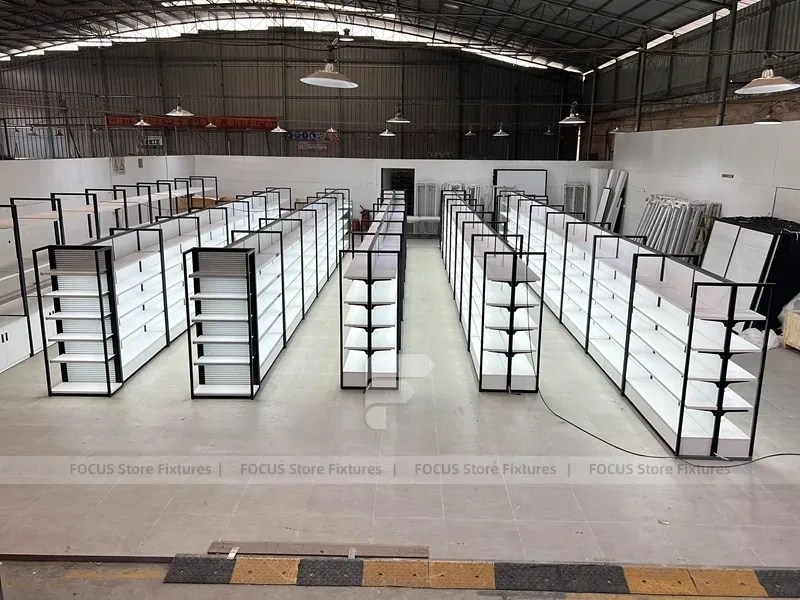 White Shelving Gondola Row with Black End Frames for Beauty Store