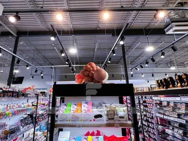 Balloon Decorated Beauty Supply Gondola and Wall Display Layout for Wig Shop