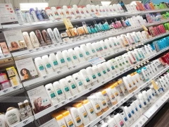 Beauty Supply Floor with Cylindrical Promo Tower and Gondolas for Wig Shop