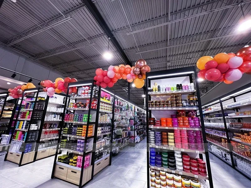 Black Framed Accessory and Beauty Supply Aisle Layout for Wig Shop