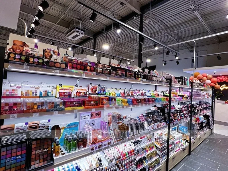 Black Framed Cosmetics Wall and Gondola Aisle Layout for Wig Shop