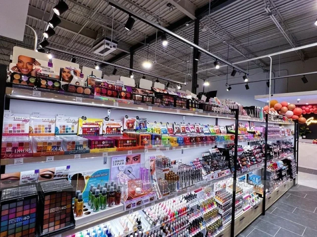 Black Framed Cosmetics Wall and Gondola Aisle Layout for Wig Shop