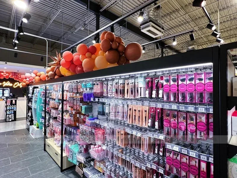 Black Framed Cosmetics Wall and Gondola Aisle Layout for Wig Shop