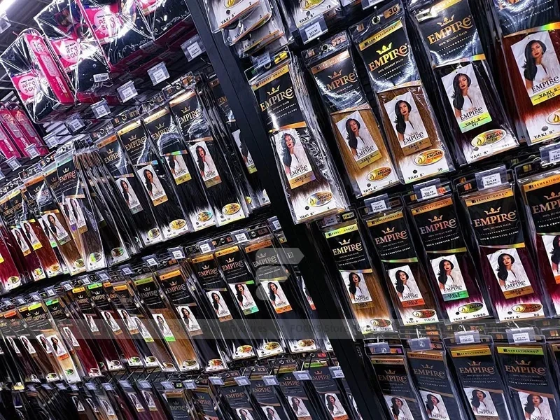 Close Up Black Metal Packaged Hair Extension Merchandising Wall for Beauty Store
