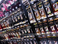 Close Up Black Metal Packaged Hair Extension Merchandising Wall for Beauty Store