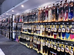 Close Up Black Metal Packaged Hair Extension Merchandising Wall for Beauty Store