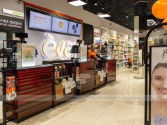 Eva Beauty Storefront with Black Cash Wrap and Side Gondolas for Wig Shop
