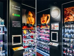 Eva Beauty Storefront with Black Cash Wrap and Side Gondolas for Wig Shop