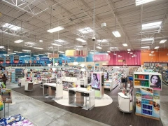 Large Cosmetics Supermarket with Circular Promo Tables for Wig Shop