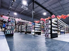 Long Dark Beauty Supply Wall Shelving Aisle for Wig Shop