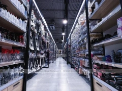 Long Dark Beauty Supply Wall Shelving Aisle for Wig Shop