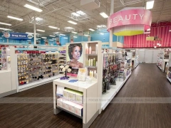 Open Beauty Supply Floor with White Shelving and Pink Sign for Wig Shop
