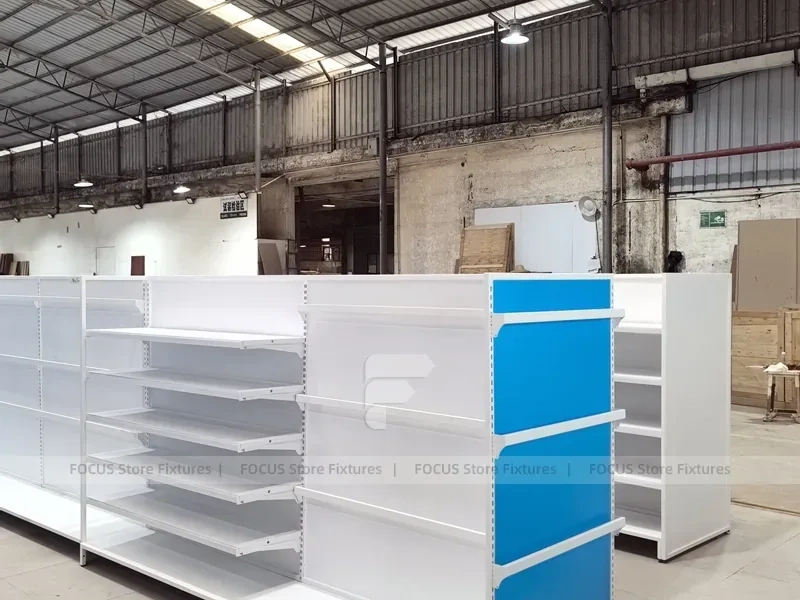 White and Blue Gondola Shelving with Layered Endcap for Beauty Store