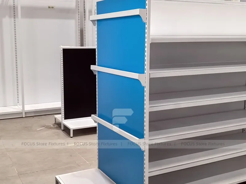 White and Blue Gondola Shelving with Layered Endcap for Beauty Store