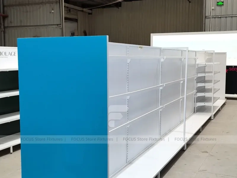 White and Blue Gondola Shelving with Layered Endcap for Beauty Store