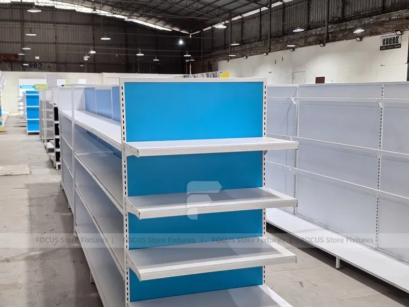 White and Blue Gondola Shelving with Layered Endcap for Beauty Store