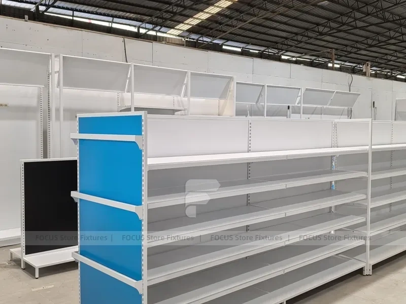 White and Blue Gondola Shelving with Layered Endcap for Beauty Store
