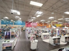 Wide Beauty Supply Retail Floor with White Shelving Rows for Wig Shop