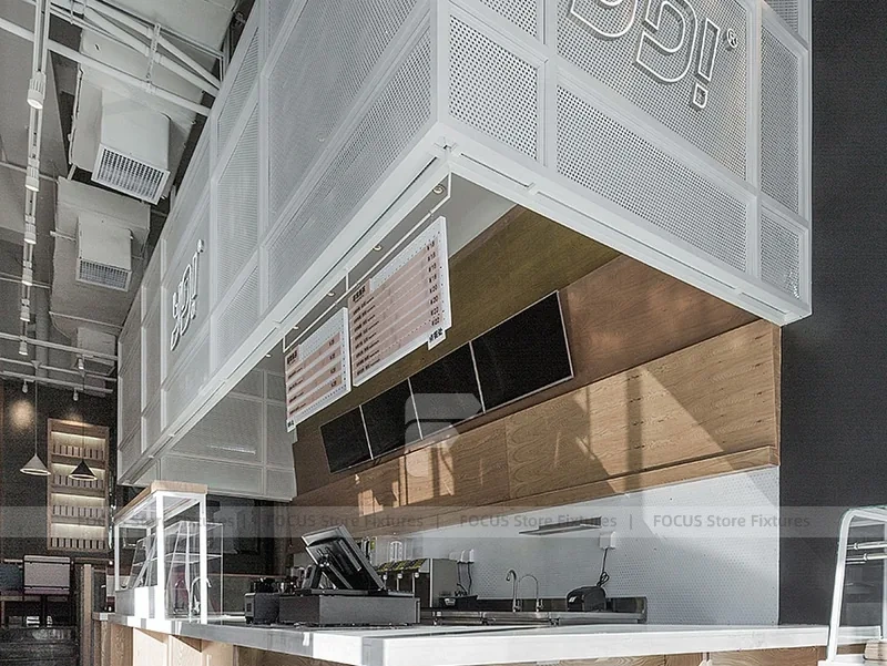 White Beverage Counter With Backlit Menu Wall